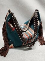 Geometric print fringed shoulder bag