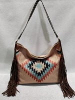 Geometric print fringed shoulder bag