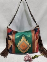 Geometric print fringed shoulder bag