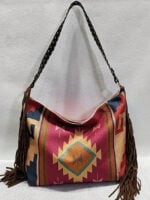 Geometric print fringed shoulder bag