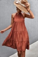 Lace-up halterneck pleated panel dress