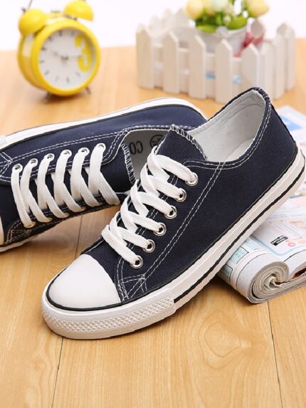 Wholesale Solid Color Lace Up Canvas Shoes