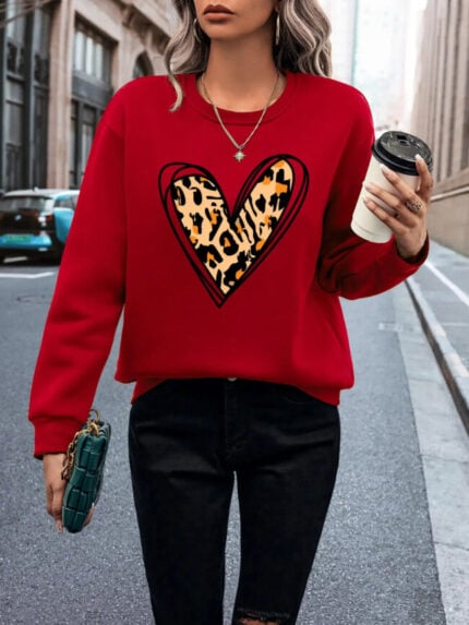 Wholesale Leopard Hollowed Out Heart Pattern Print Long Sleeve Top