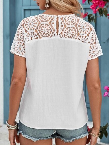 Wholesale solid color button back lace panel short sleeve top